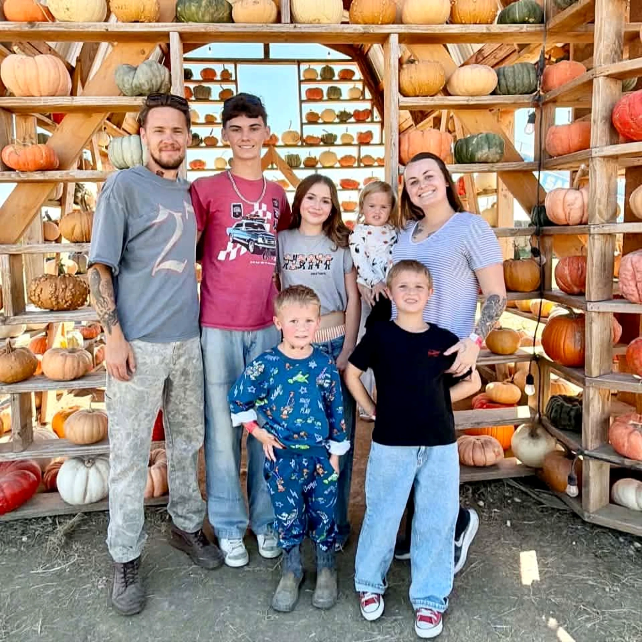 Nick Perkins with his wife and five children at a pumpkin patch in Meridian, Idaho
